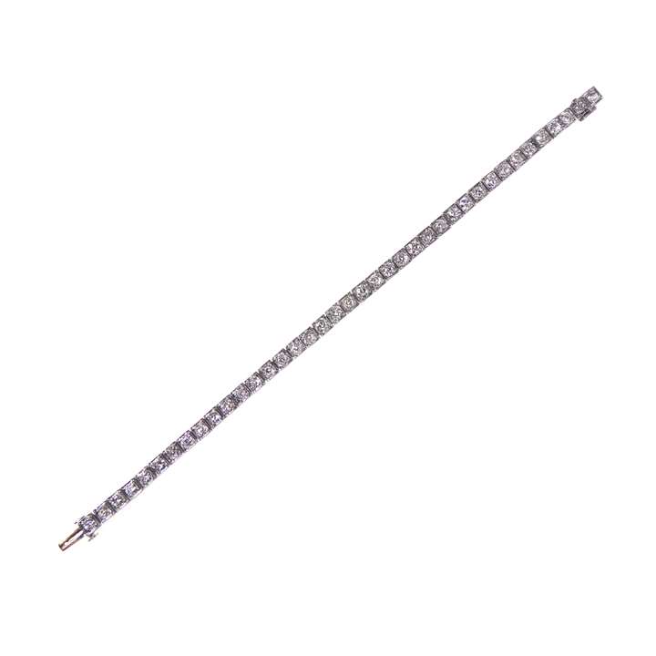 Diamond line bracelet, box collet set with 39 cushion and round brilliant cut diamonds,